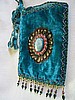 Turquoise vertical w/ feathers