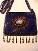 Lavender small purse w/ feathers 