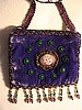 Lavender small purse 10 pts. around center stone