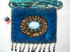 Turquoise small bag w/ feathers