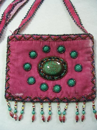 Pink small purse w/ 10 pts. around center